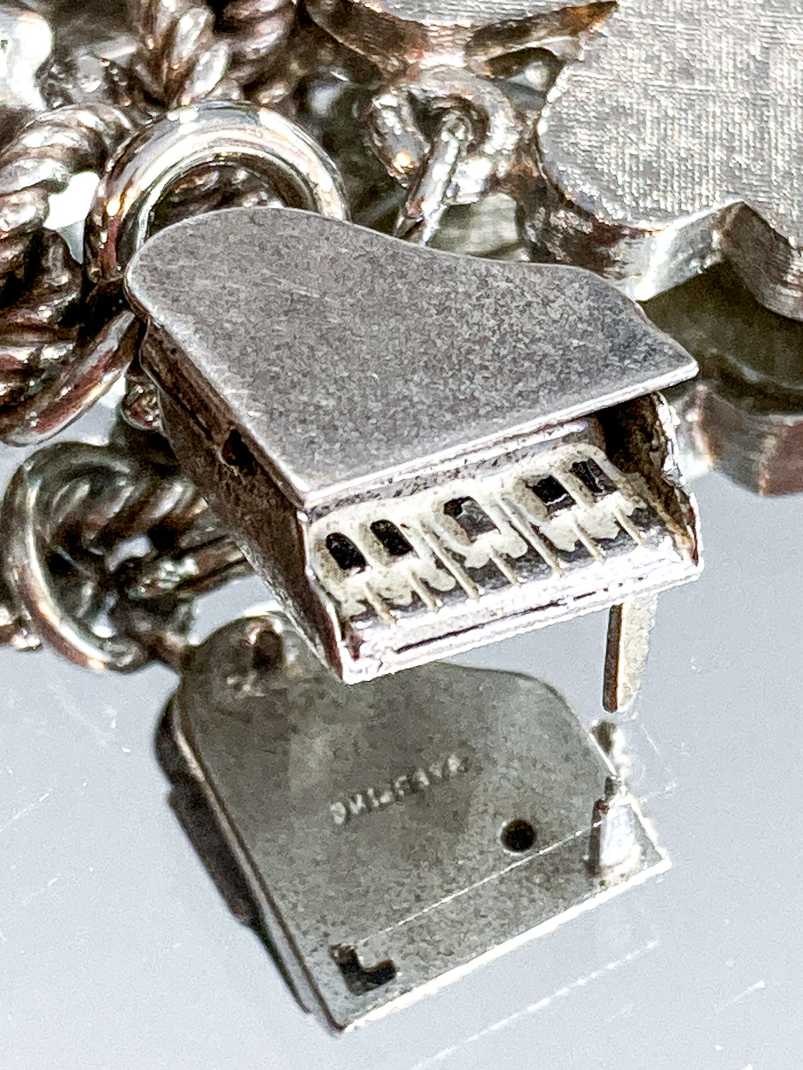Vintage Sterling Silver Enameled Articulate Piano Charm Bracelet