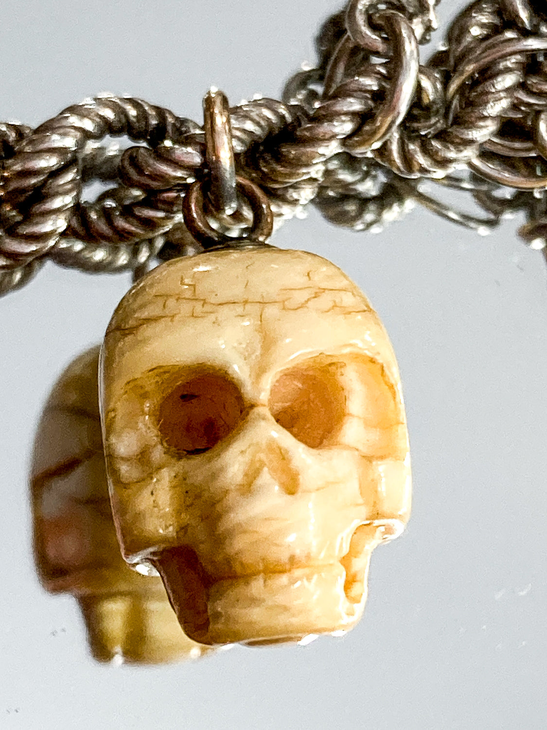 Vintage Sterling Silver Ivory Carved Skull Charm Bracelet